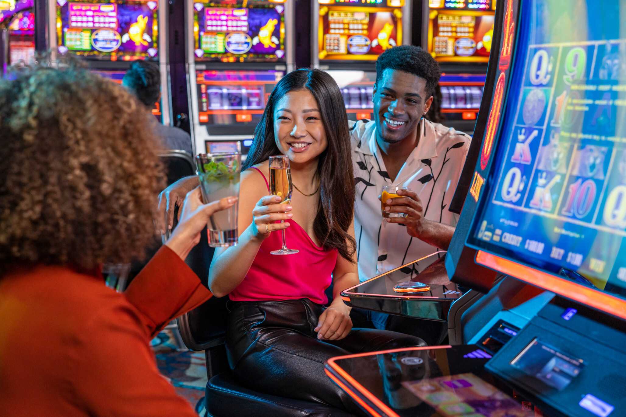 Friends enjoy a drink at the slots at Jamul Casino